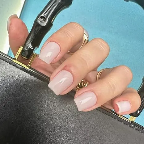 Champagne Hijabi Nails showcasing a luxurious, elegant design with a glossy finish, perfect for bridal style inspiration and featuring wudu-friendly functionality.