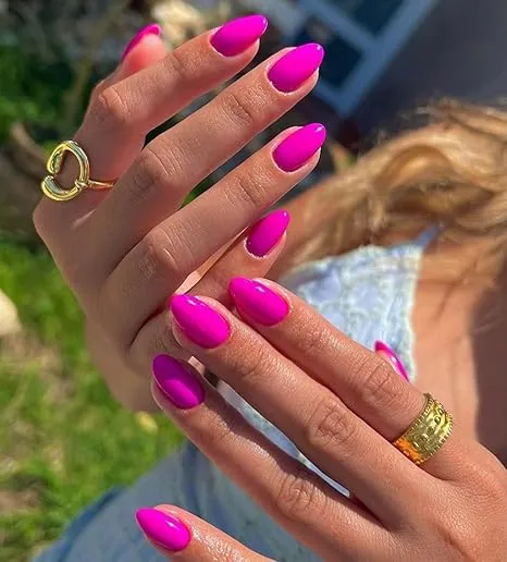 Fuschia Hijabi Nails featuring a unique beauty effect in rani pink, designed for bridal style inspiration while adhering to Islamic fashion.