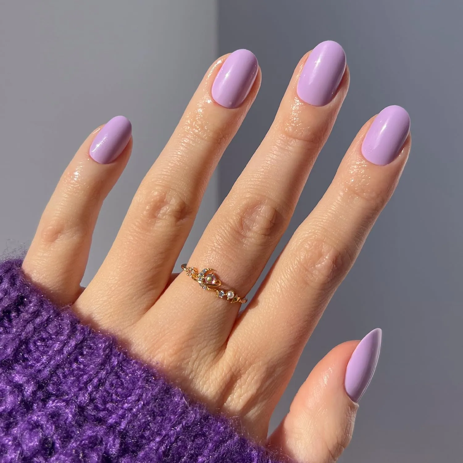 Lilac Hijabi Nails in a soft pastel purple, ideal for modest brides seeking prayer-friendly materials.