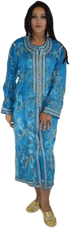 Traditional bridal caftan in a bold blue color with shiny fabric for a bride at a wedding ceremony.